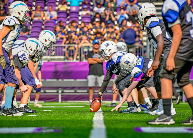 Youth football players at the line of scrimmage, Minneapolis sport photography